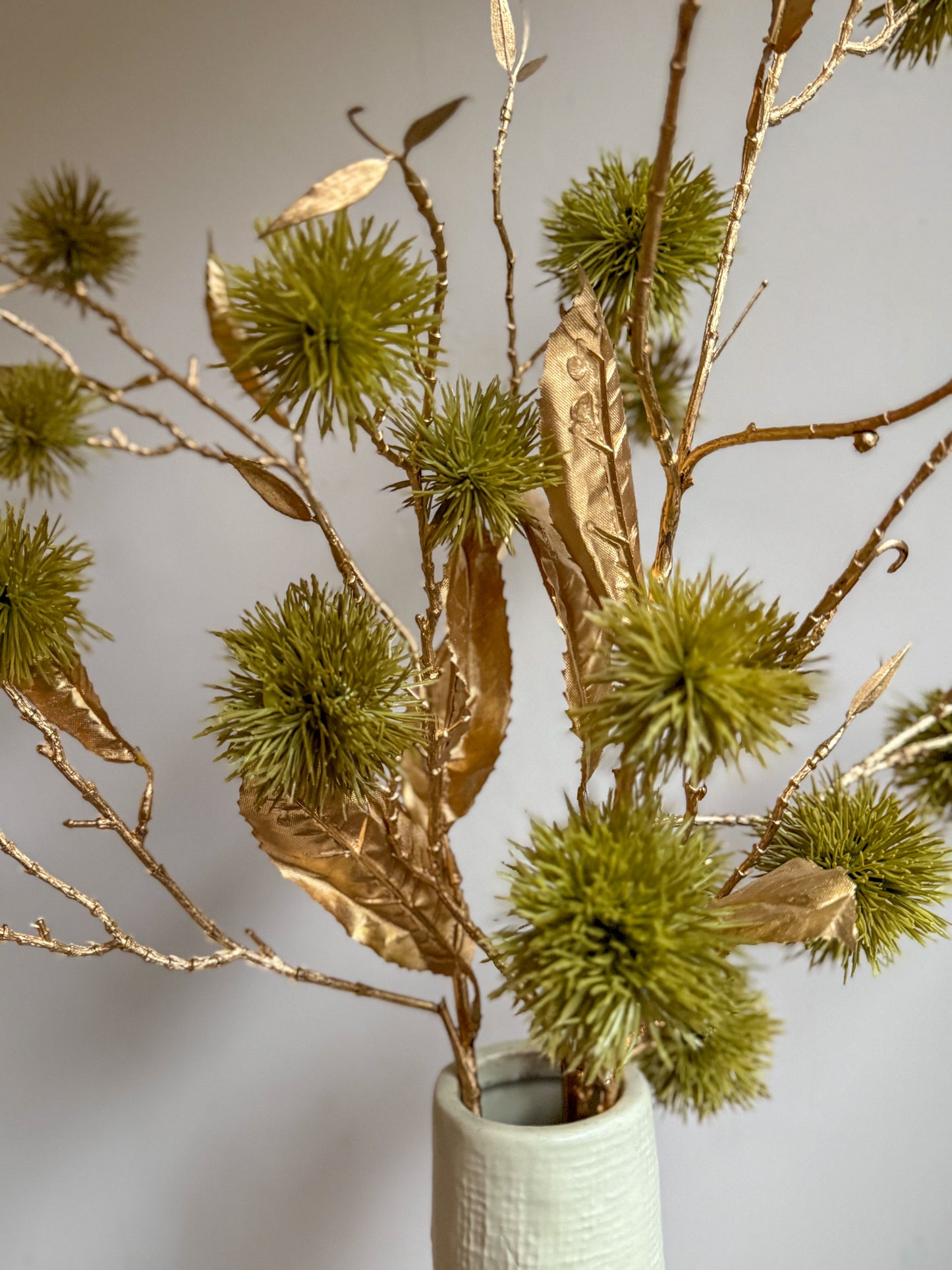 Kastanje tak met gouden blad