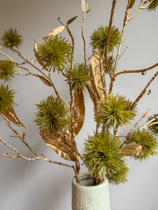 Kastanje tak met gouden blad